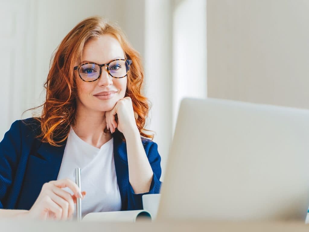 woman smiling with laptop